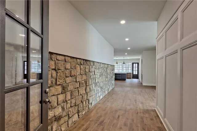 a view of entryway with wooden floor