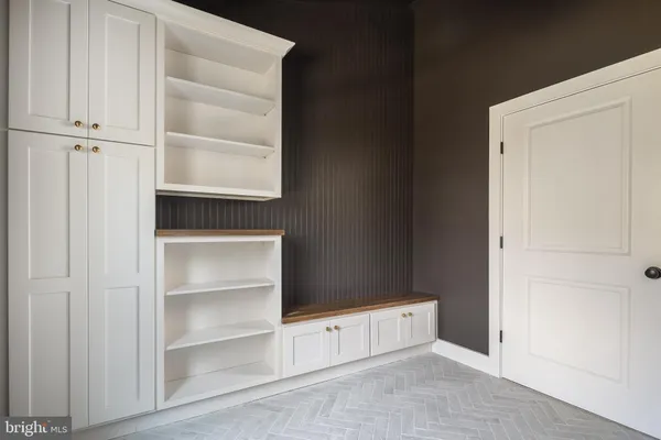 a bathroom with a sink a toilet and bathtub