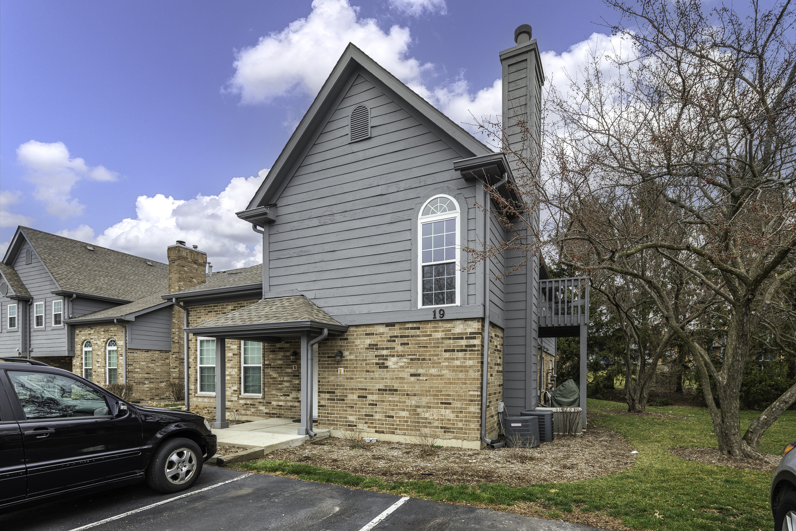 a car parked in front of a house