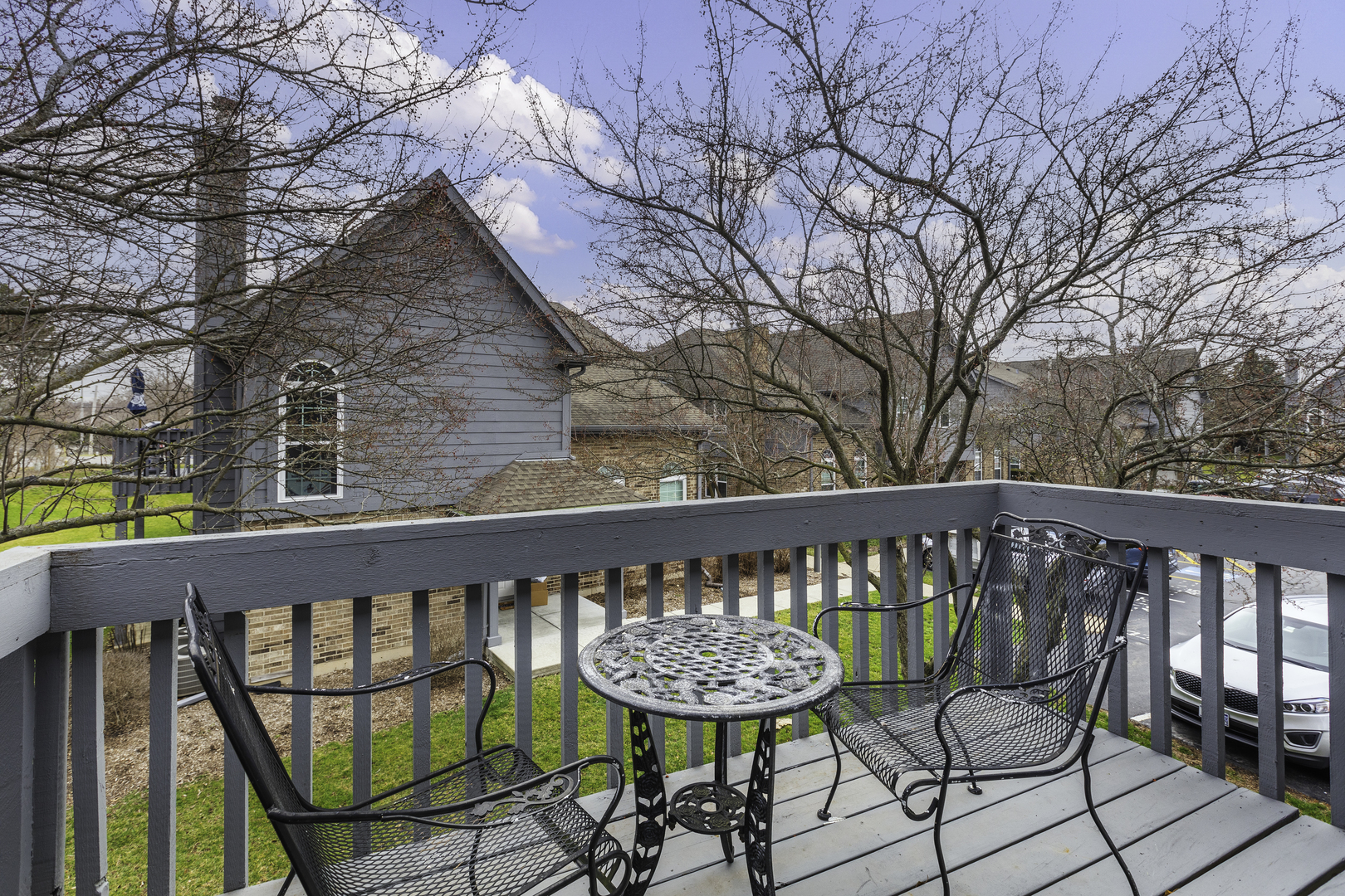 19 Foxcroft Road, Unit 203 Naperville, IL 60565 - Photo 14 of 29 a view of a chairs in a balcony