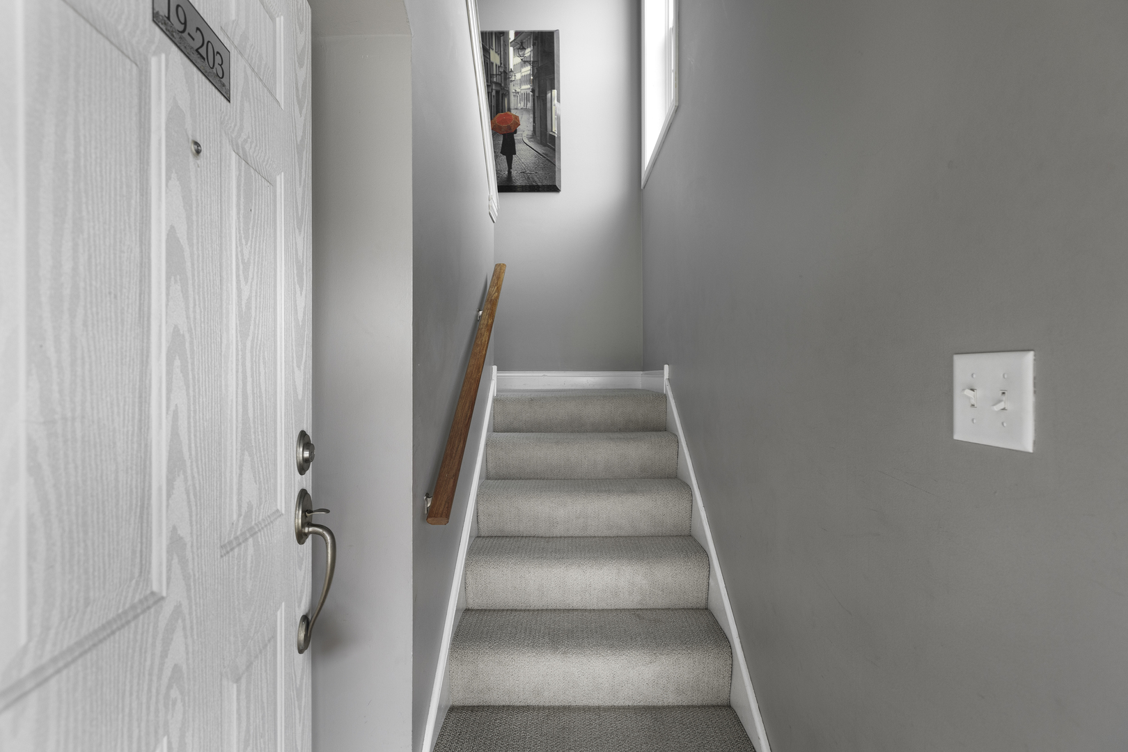 19 Foxcroft Road, Unit 203 Naperville, IL 60565 - Photo 18 of 29 a view of staircase with white walls