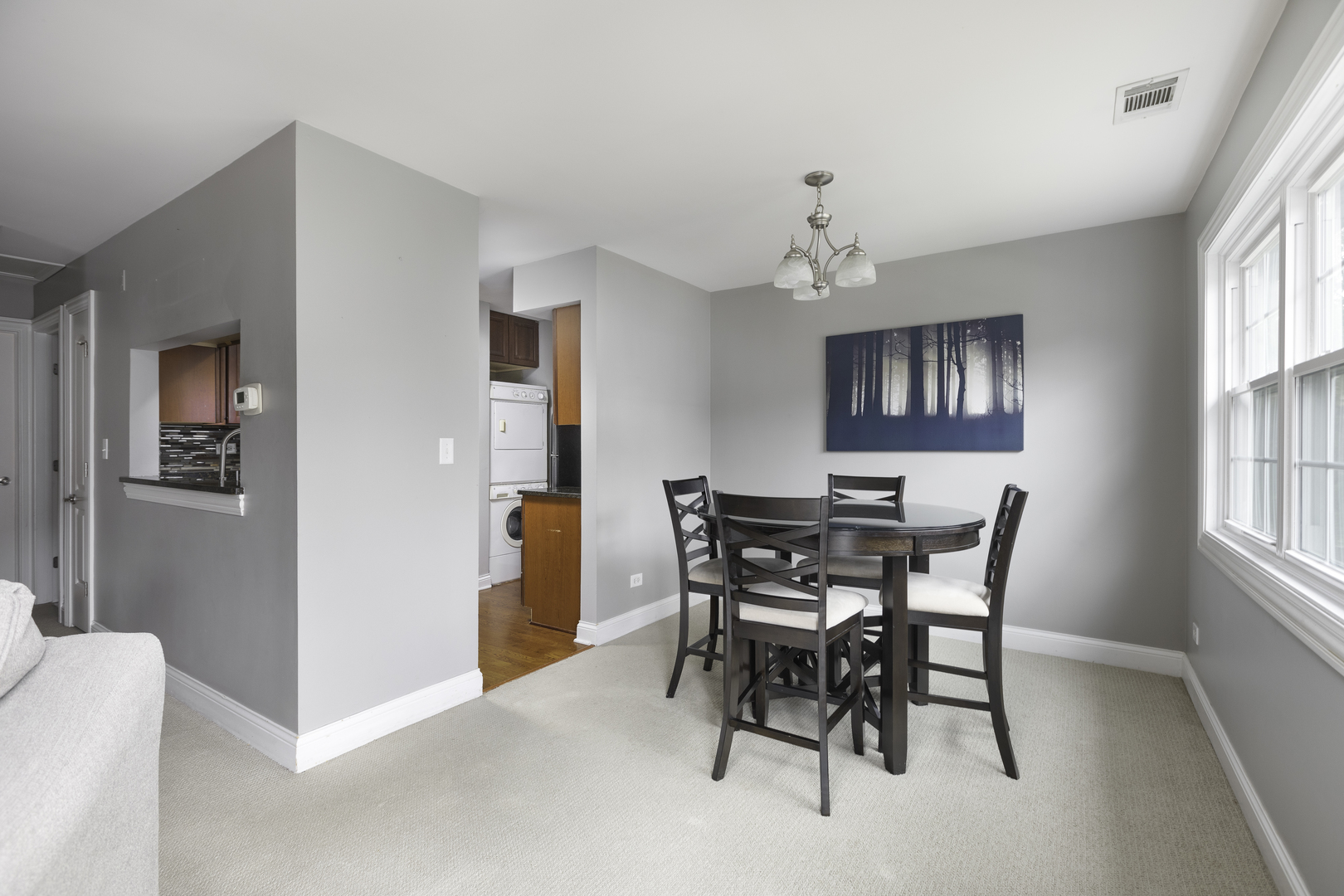 19 Foxcroft Road, Unit 203 Naperville, IL 60565 - Photo 10 of 29 a view of a dining room with furniture and window