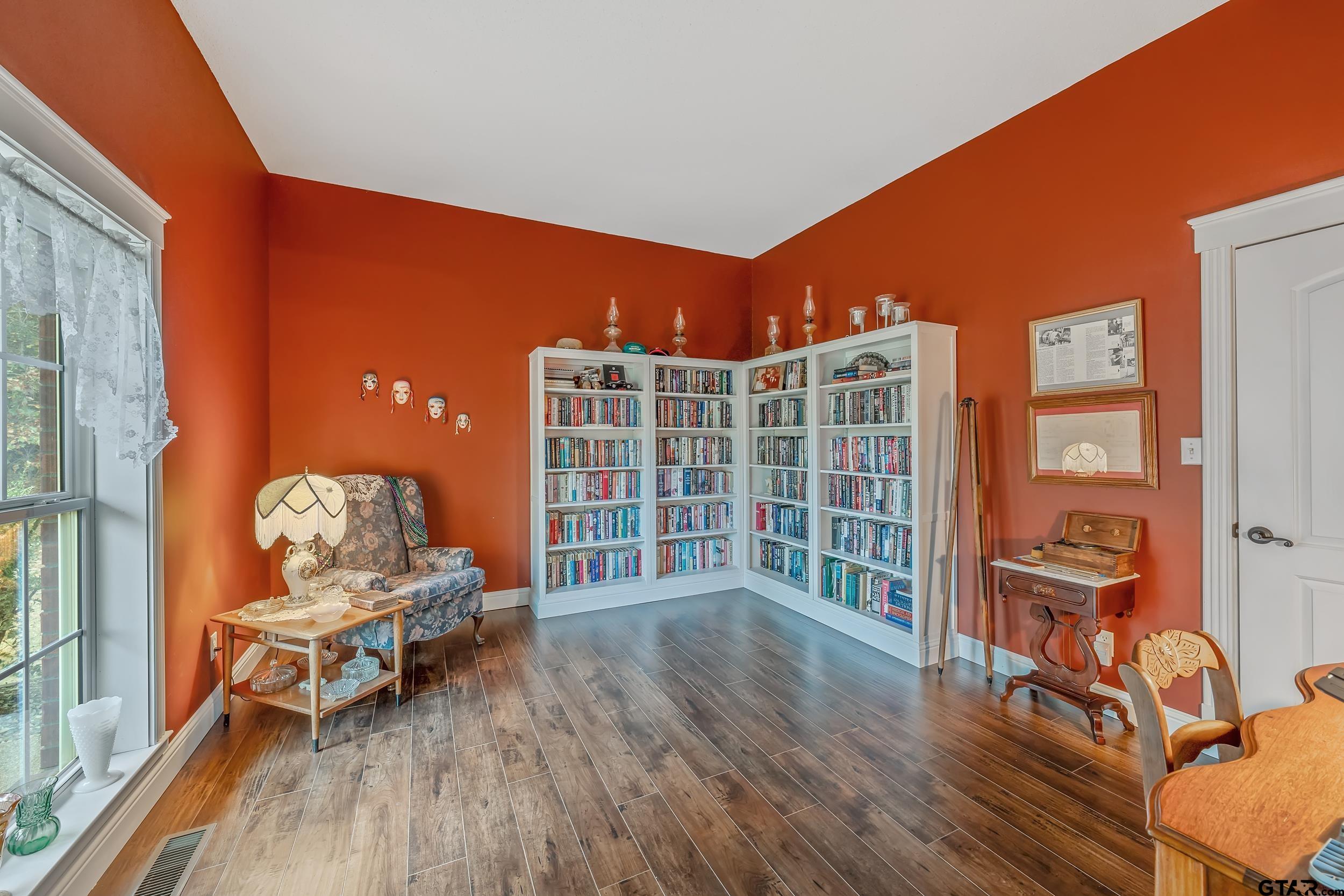 14375 County Road 384 Tyler, TX 75708 - Photo 13 of 48 a living room with furniture a rug potted plant and a large window