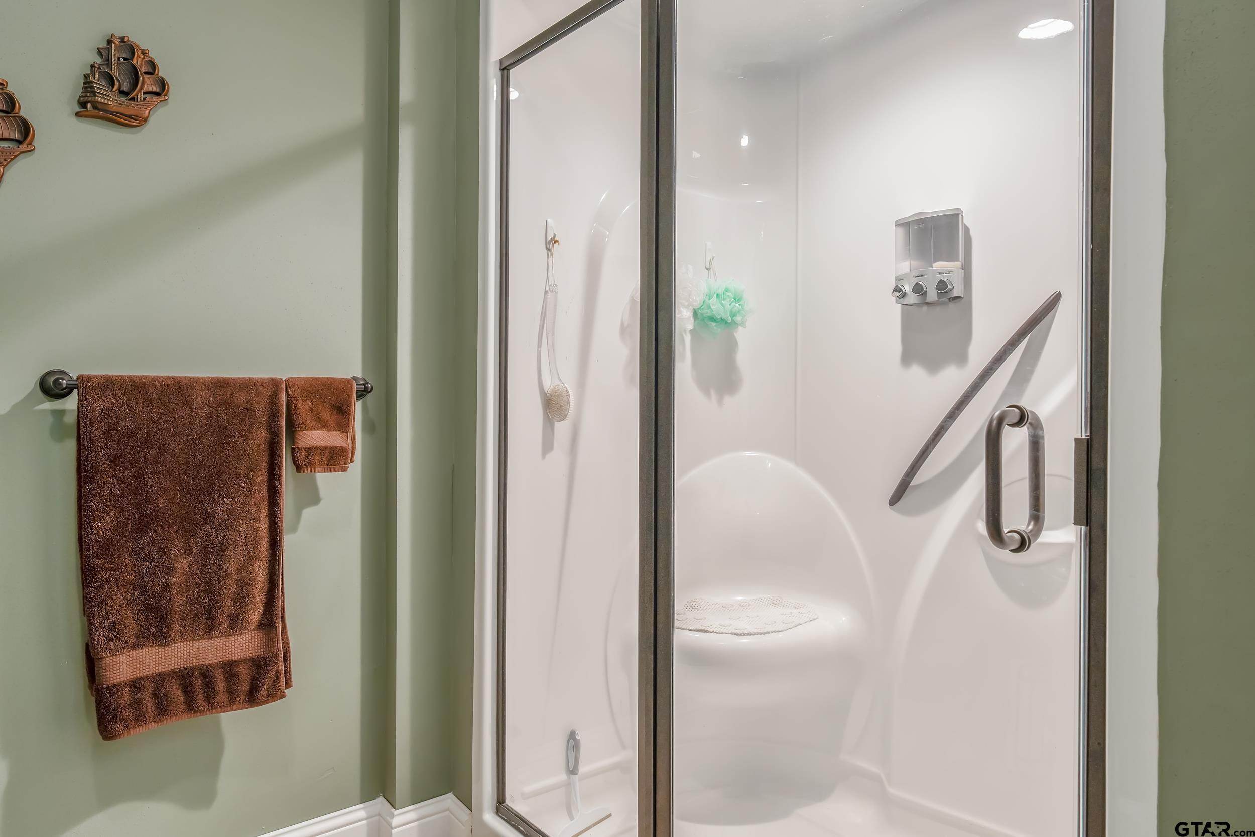 14375 County Road 384 Tyler, TX 75708 - Photo 19 of 48 a picture of a bathroom with a shower