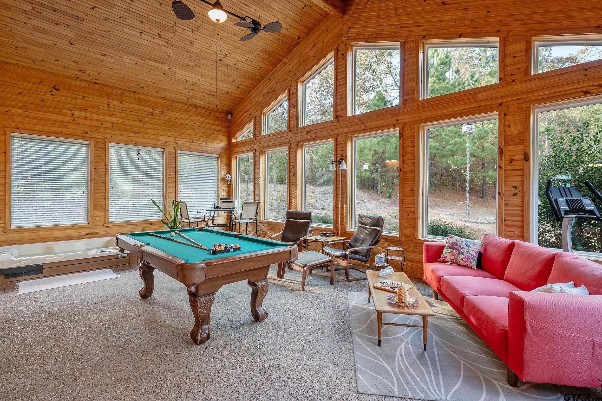 14375 County Road 384 Tyler, TX 75708 - Photo 20 of 48 a room with furniture and a large window