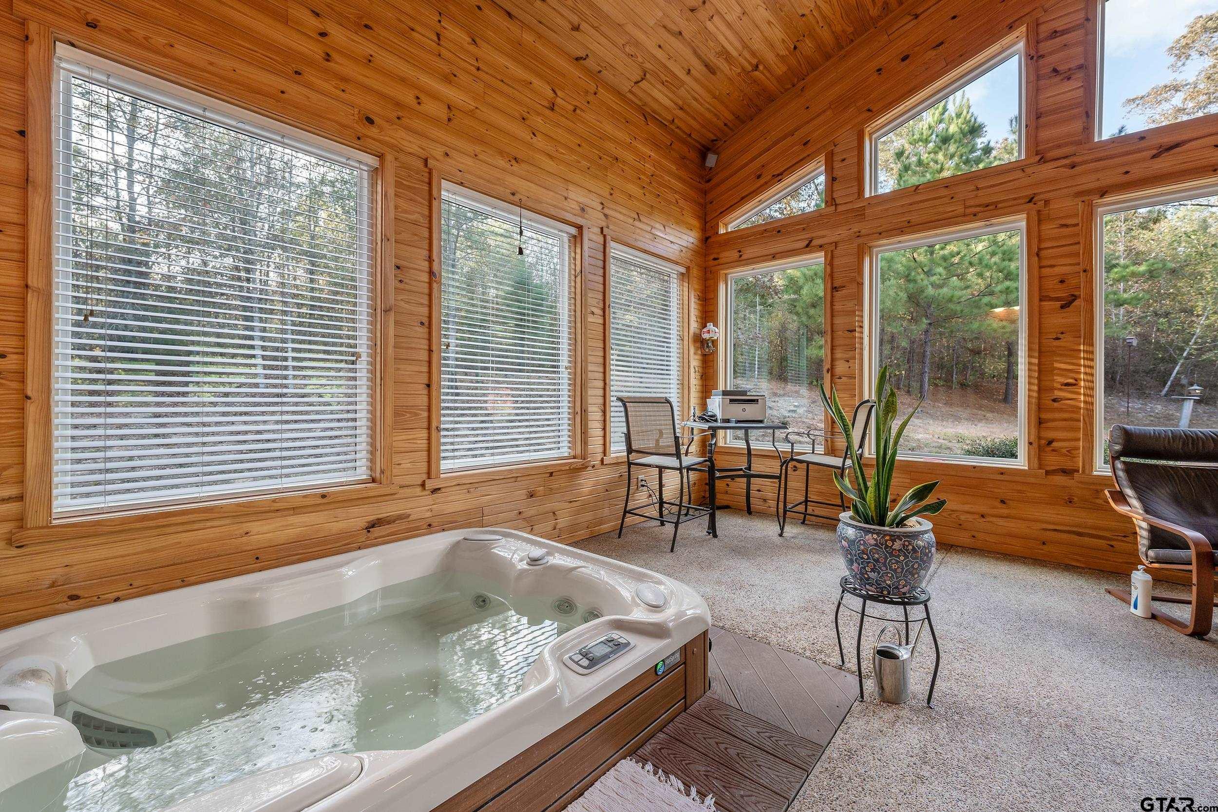 14375 County Road 384 Tyler, TX 75708 - Photo 21 of 48 a living room filled with furniture and a large window