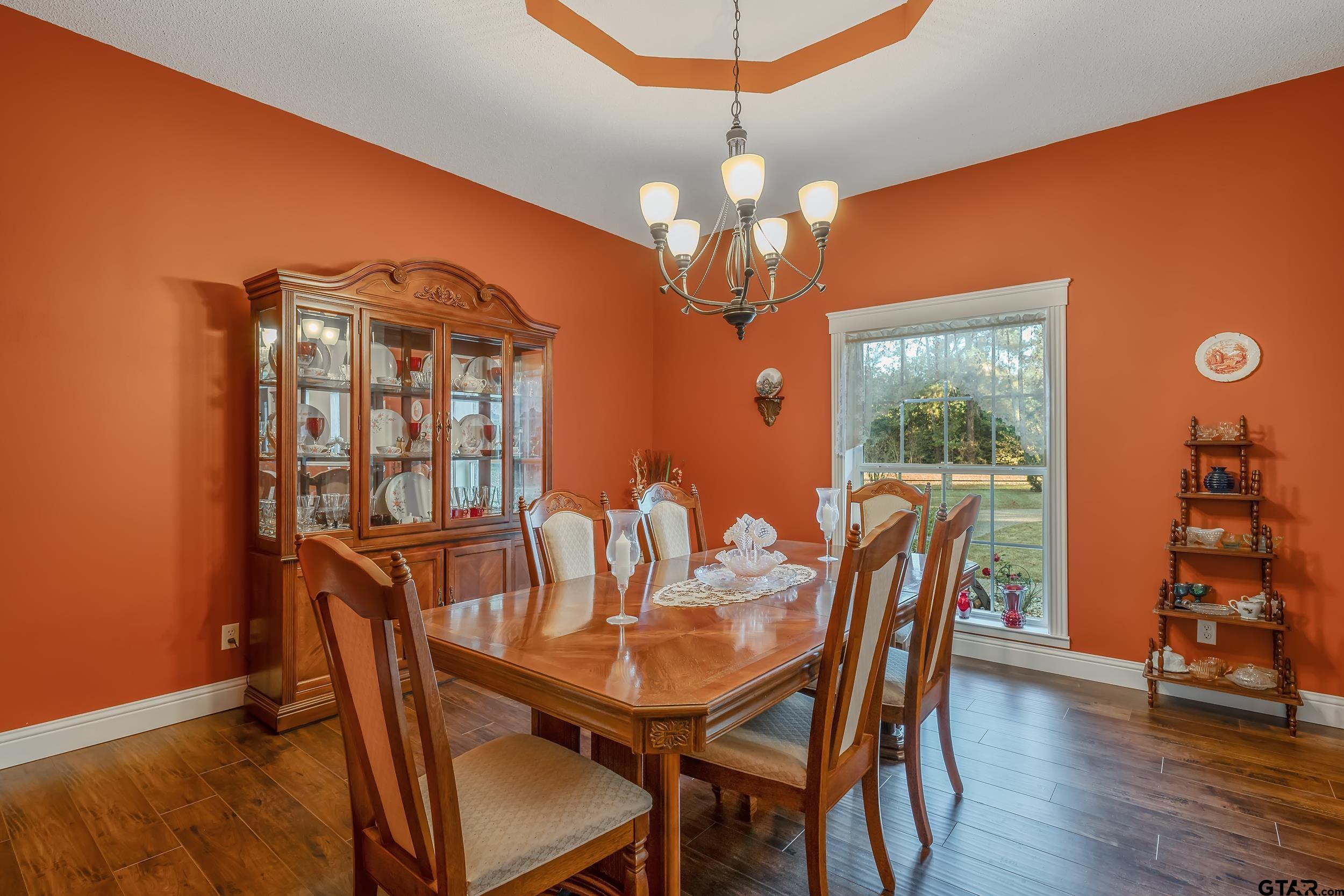 14375 County Road 384 Tyler, TX 75708 - Photo 27 of 48 a view of a dining room with furniture window and wooden floor