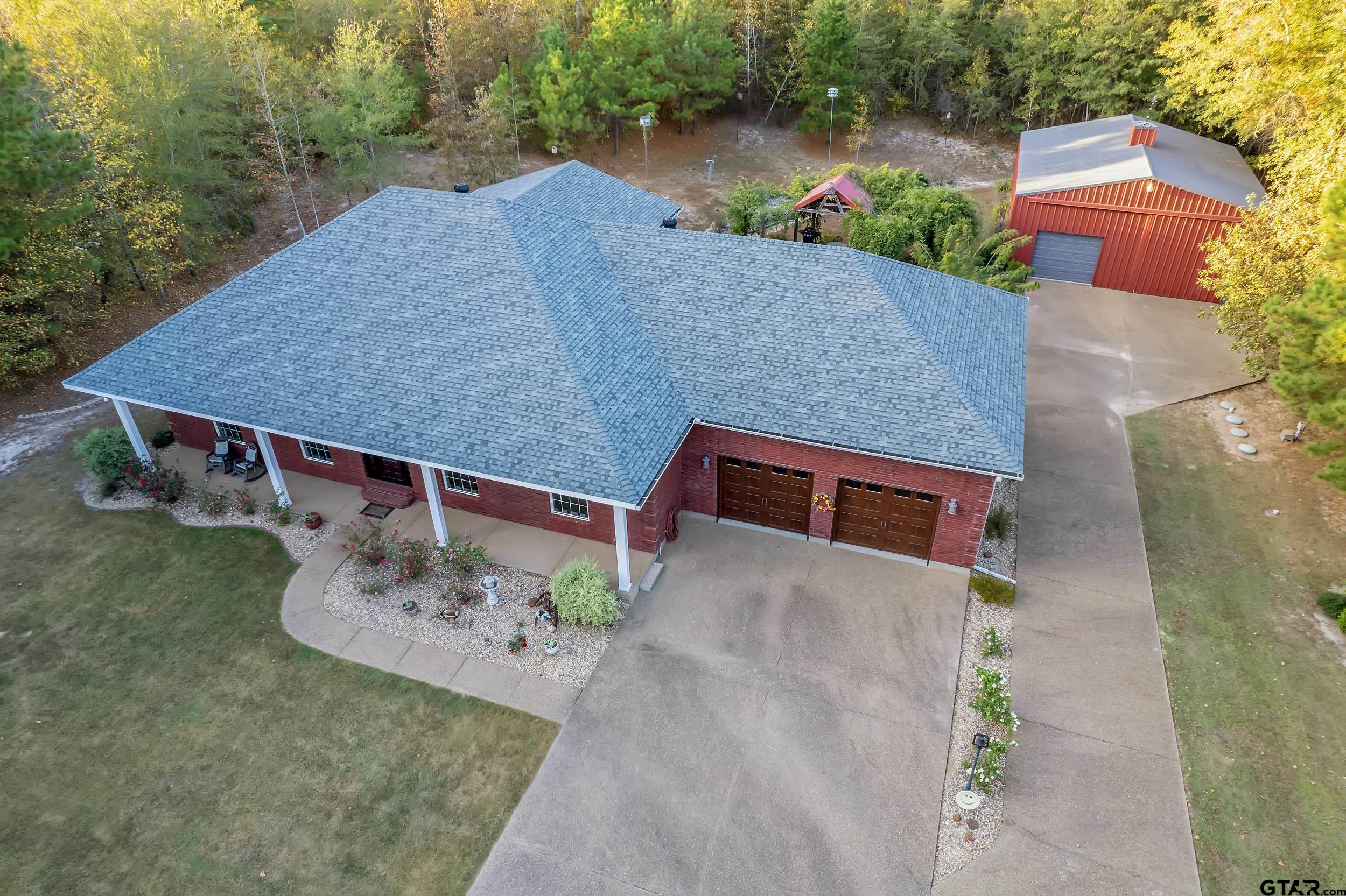 14375 County Road 384 Tyler, TX 75708 - Photo 3 of 48 an aerial view of a house having yard