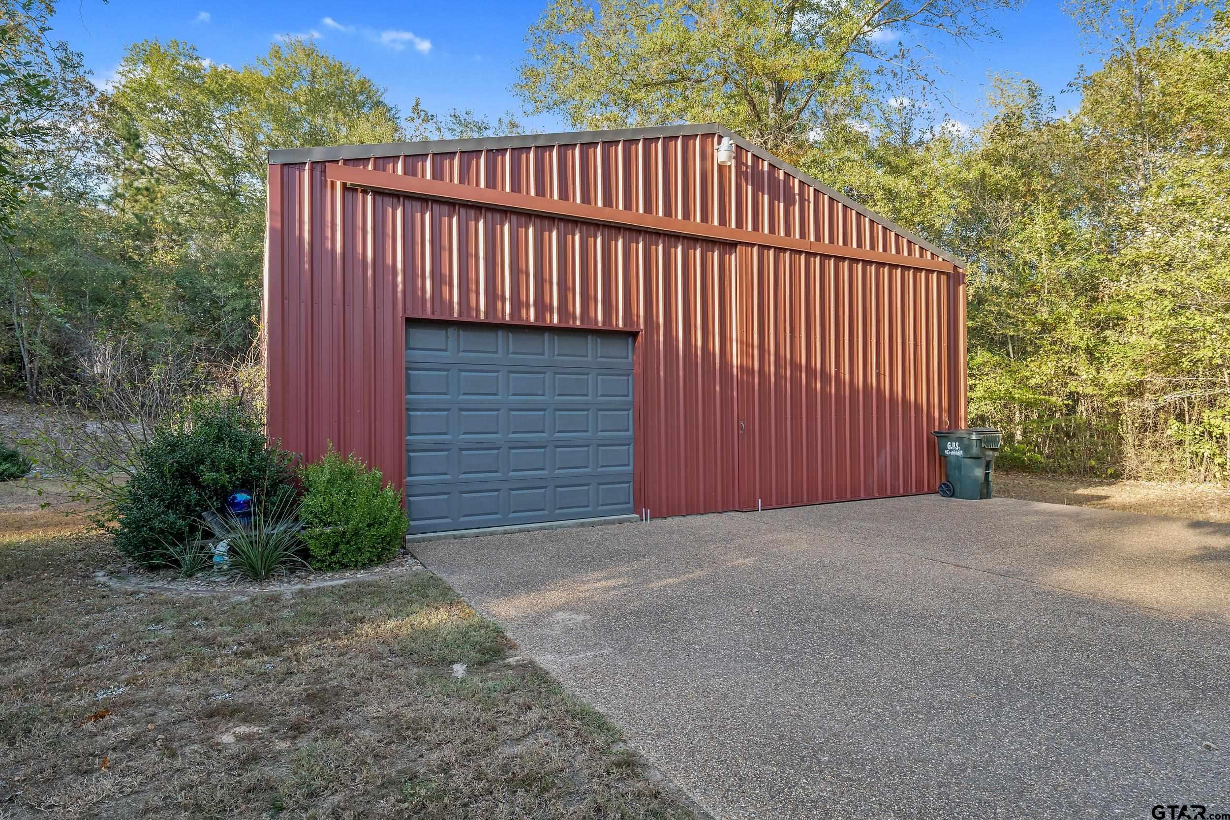 14375 County Road 384 Tyler, TX 75708 - Photo 34 of 48 a view of a house with a yard