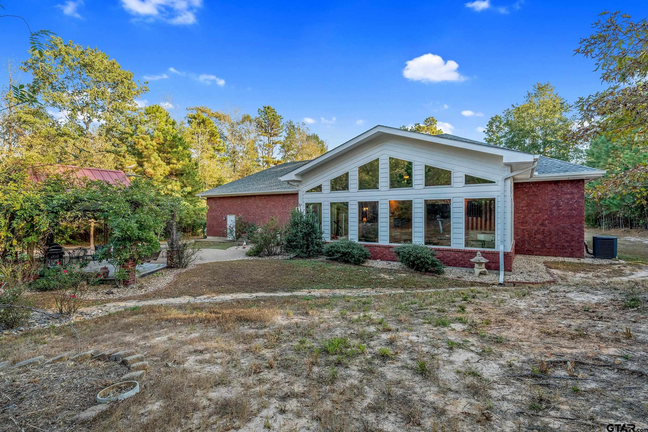 14375 County Road 384 Tyler, TX 75708 - Photo 37 of 48 a front view of a house with a yard