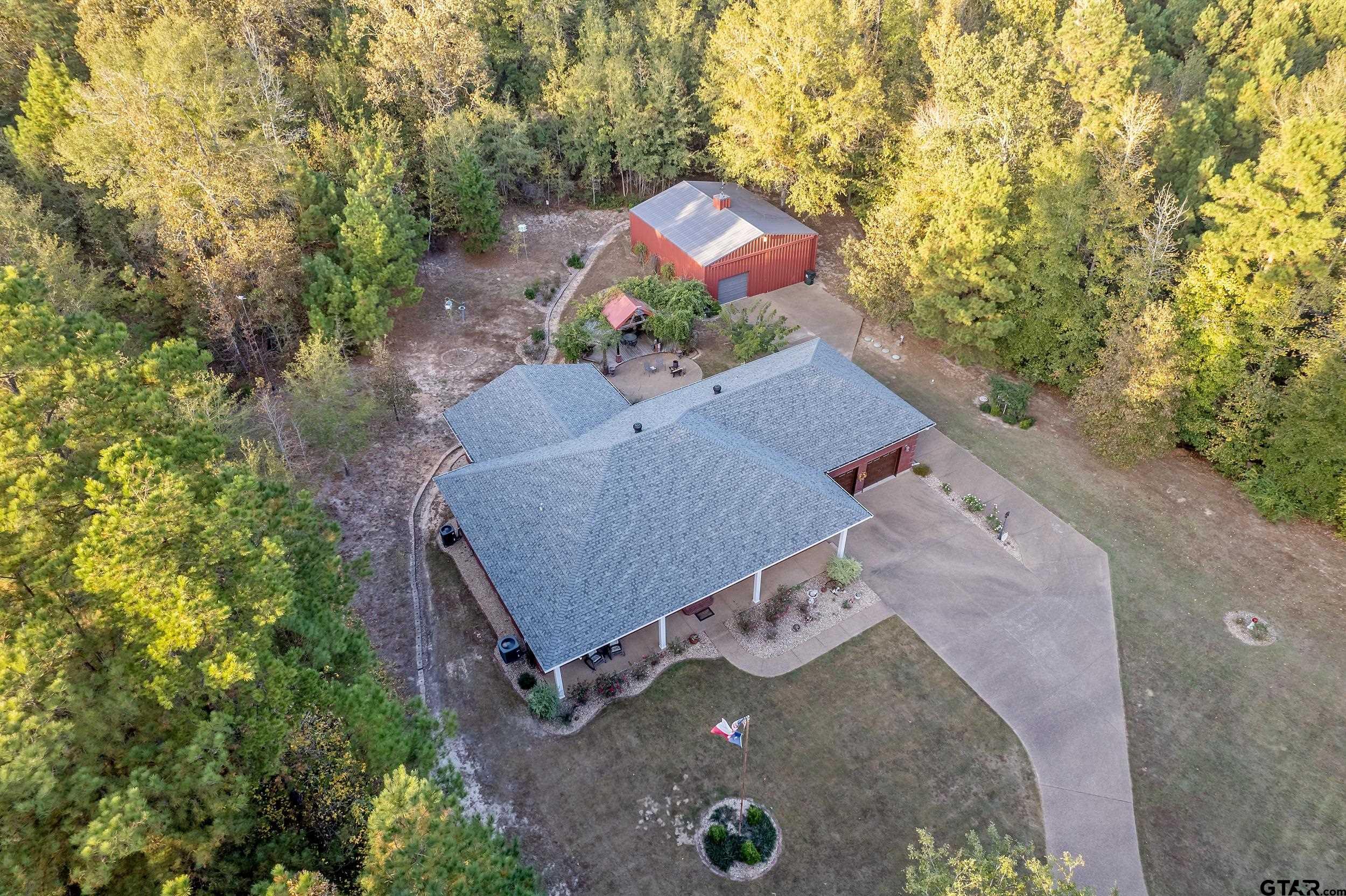 14375 County Road 384 Tyler, TX 75708 - Photo 4 of 48 an aerial view of a house with a yard
