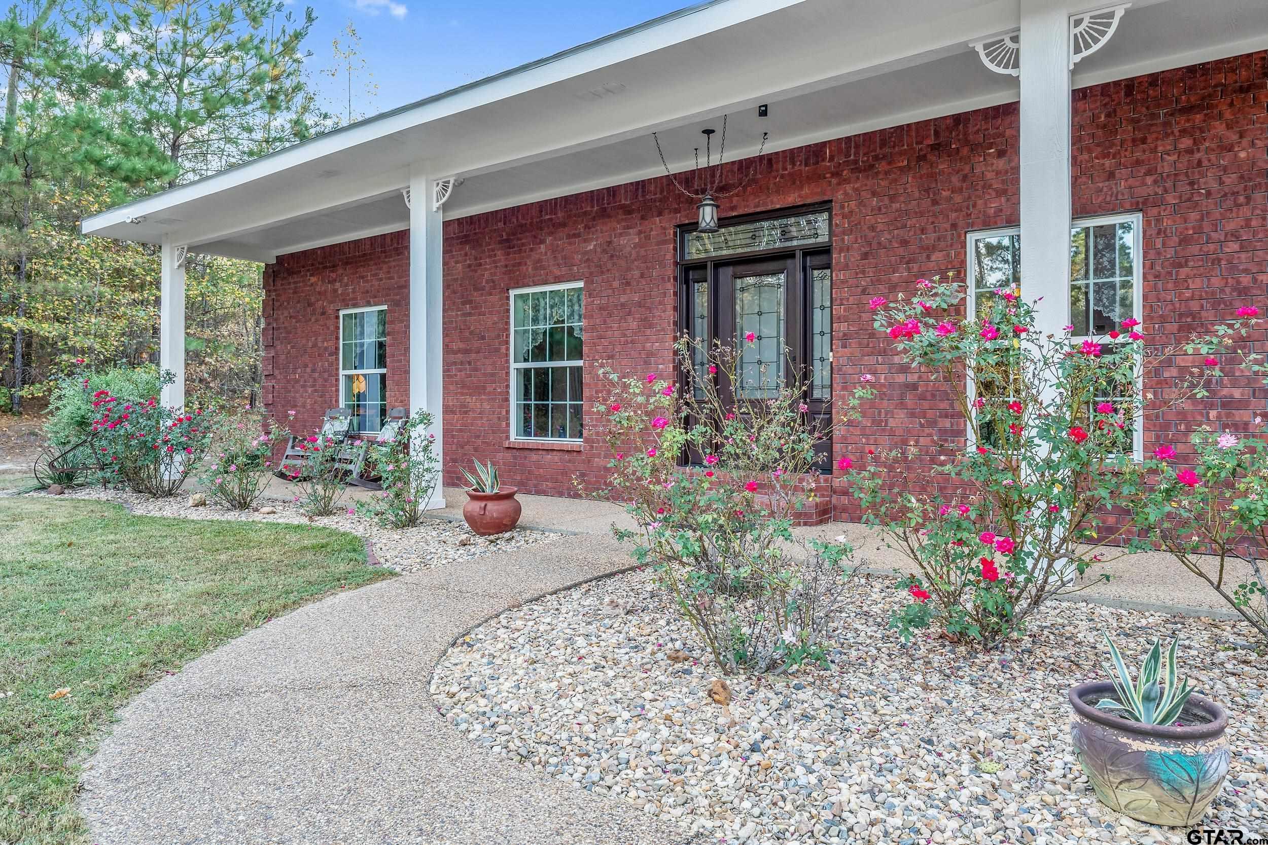 14375 County Road 384 Tyler, TX 75708 - Photo 41 of 48 a front view of a house with a porch