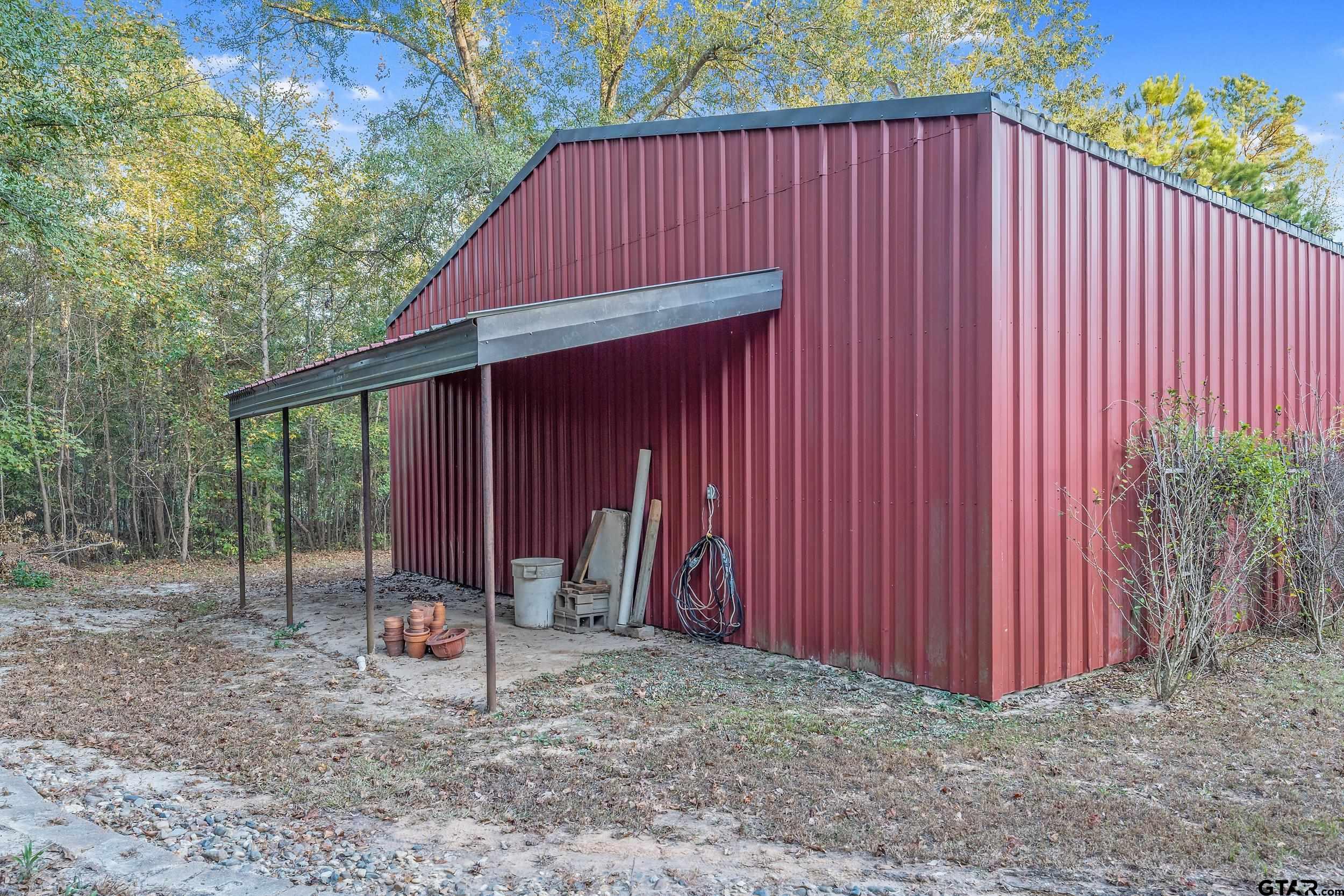 14375 County Road 384 Tyler, TX 75708 - Photo 43 of 48 a backyard of a house