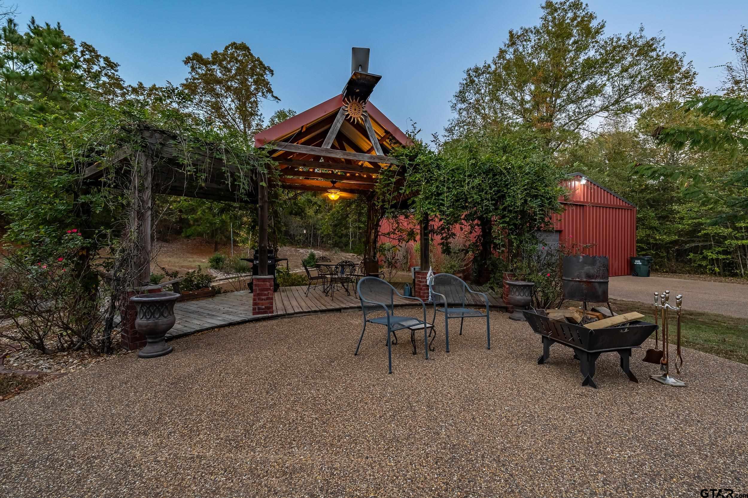 14375 County Road 384 Tyler, TX 75708 - Photo 46 of 48 a view of a house with backyard and sitting area