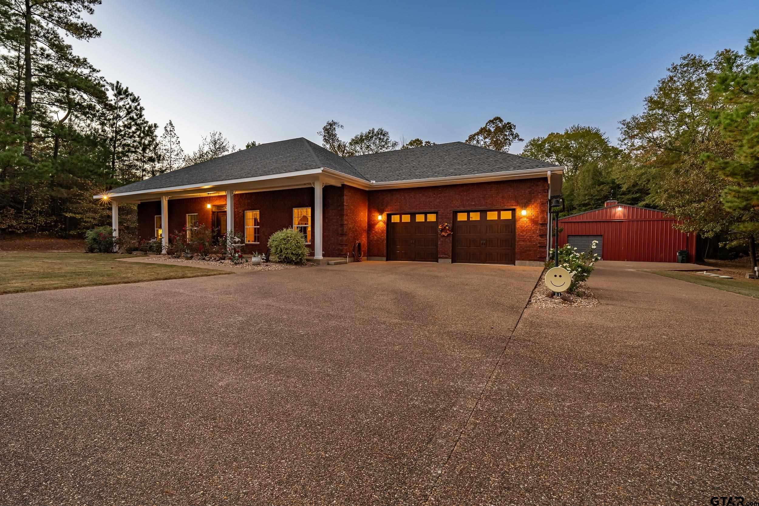14375 County Road 384 Tyler, TX 75708 - Photo 47 of 48 a view of a house with a yard and pathway