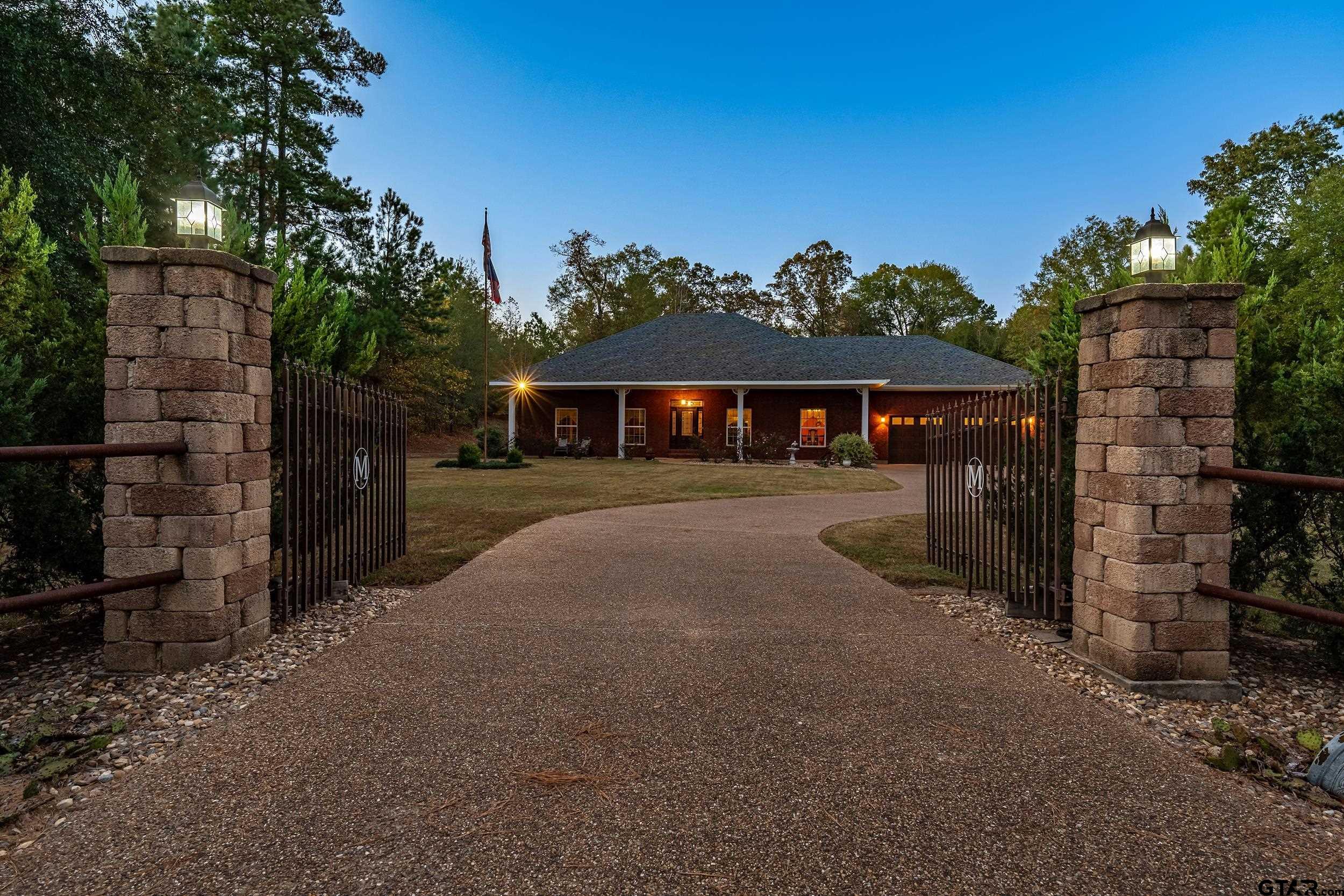 14375 County Road 384 Tyler, TX 75708 - Photo 48 of 48 a front view of a house with a yard