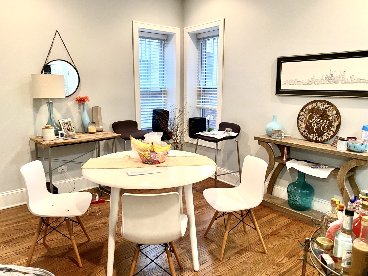 Undisclosed Address Chicago, IL 60657 - Photo 2 of 12 a view of a dining room and hall with furniture