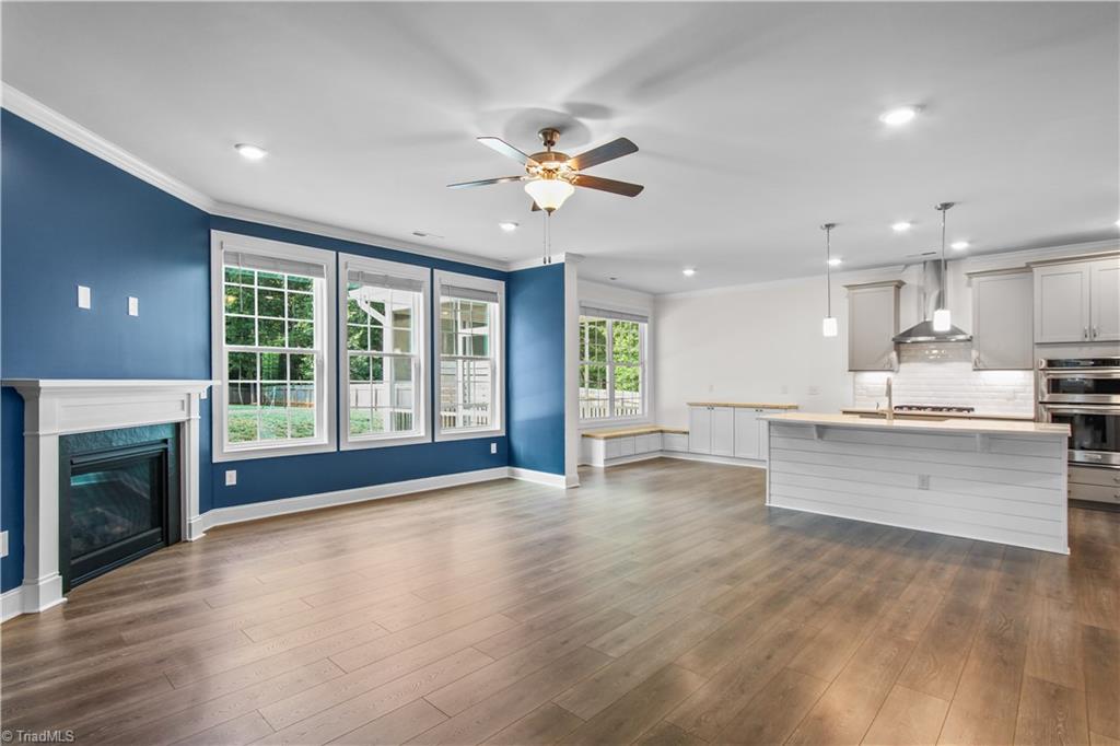 2071 Spring Wind Road Pfafftown, NC 27040 - Photo 8 of 35 Great room to kitchen & breakfast