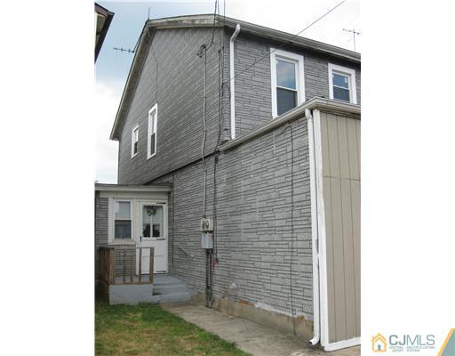 721 Lincoln Boulevard Middlesex, NJ 08846 - Photo 4 of 10 a front view of a house
