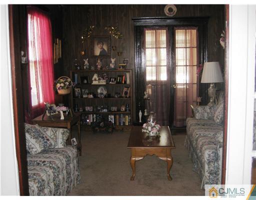 721 Lincoln Boulevard Middlesex, NJ 08846 - Photo 5 of 10 a dining room with furniture and a large window