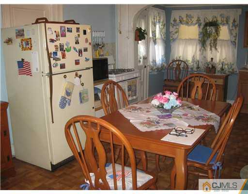 721 Lincoln Boulevard Middlesex, NJ 08846 - Photo 7 of 10 a view of a dining room with furniture
