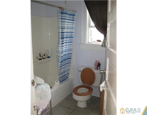 721 Lincoln Boulevard Middlesex, NJ 08846 - Photo 9 of 10 a bathroom with a toilet and a sink