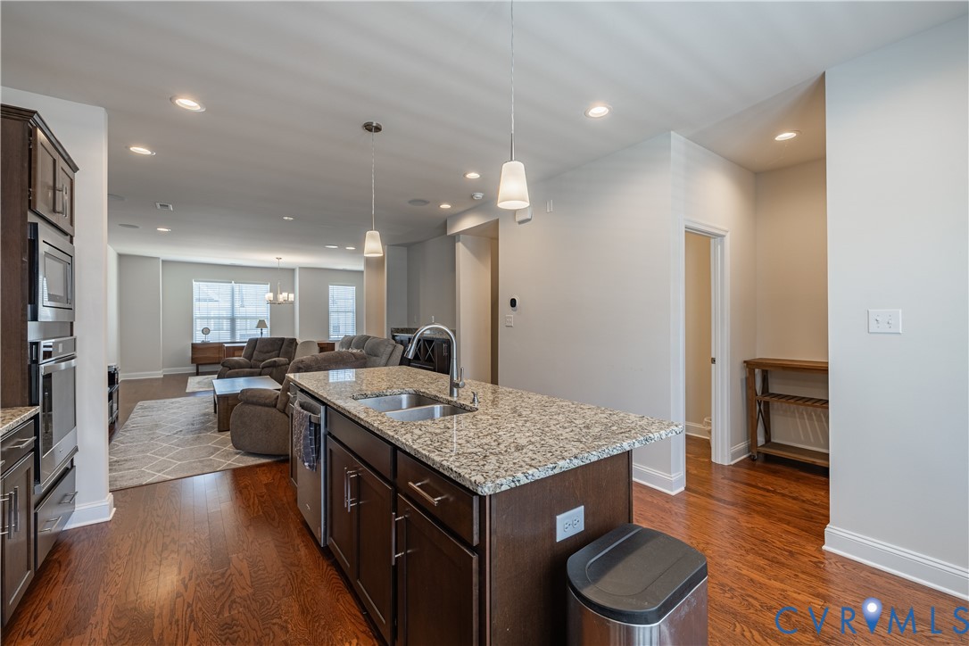 Kitchen island with a double basin sink and granit