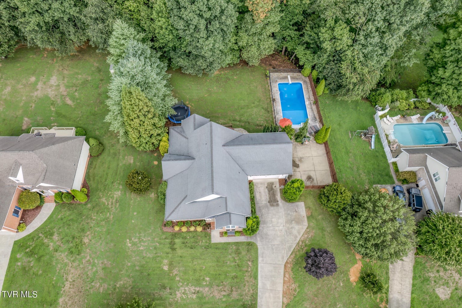 1828 Weaver Branch Road Piney Flats, TN 37686 - Photo 14 of 54 an aerial view of house with yard and outdoor seating