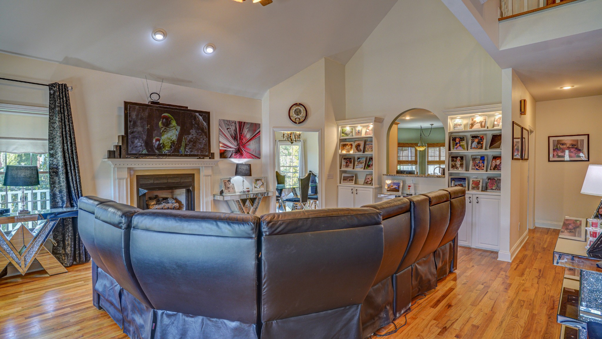 1828 Weaver Branch Road Piney Flats, TN 37686 - Photo 23 of 54 a living room with furniture a flat screen tv and a fireplace