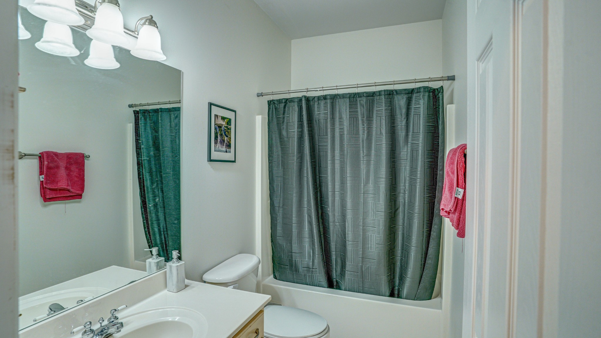 1828 Weaver Branch Road Piney Flats, TN 37686 - Photo 47 of 54 a bathroom with a sink vanity mirror and toilet
