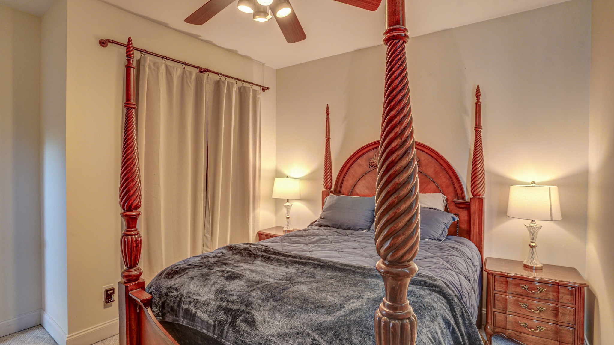 1828 Weaver Branch Road Piney Flats, TN 37686 - Photo 49 of 54 a bedroom with a bed and a chandelier