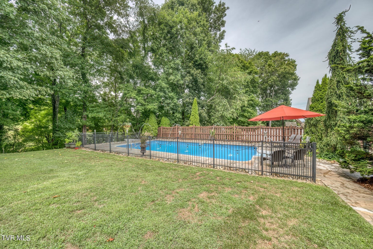 1828 Weaver Branch Road Piney Flats, TN 37686 - Photo 7 of 54 a view of a house with a yard and sitting area