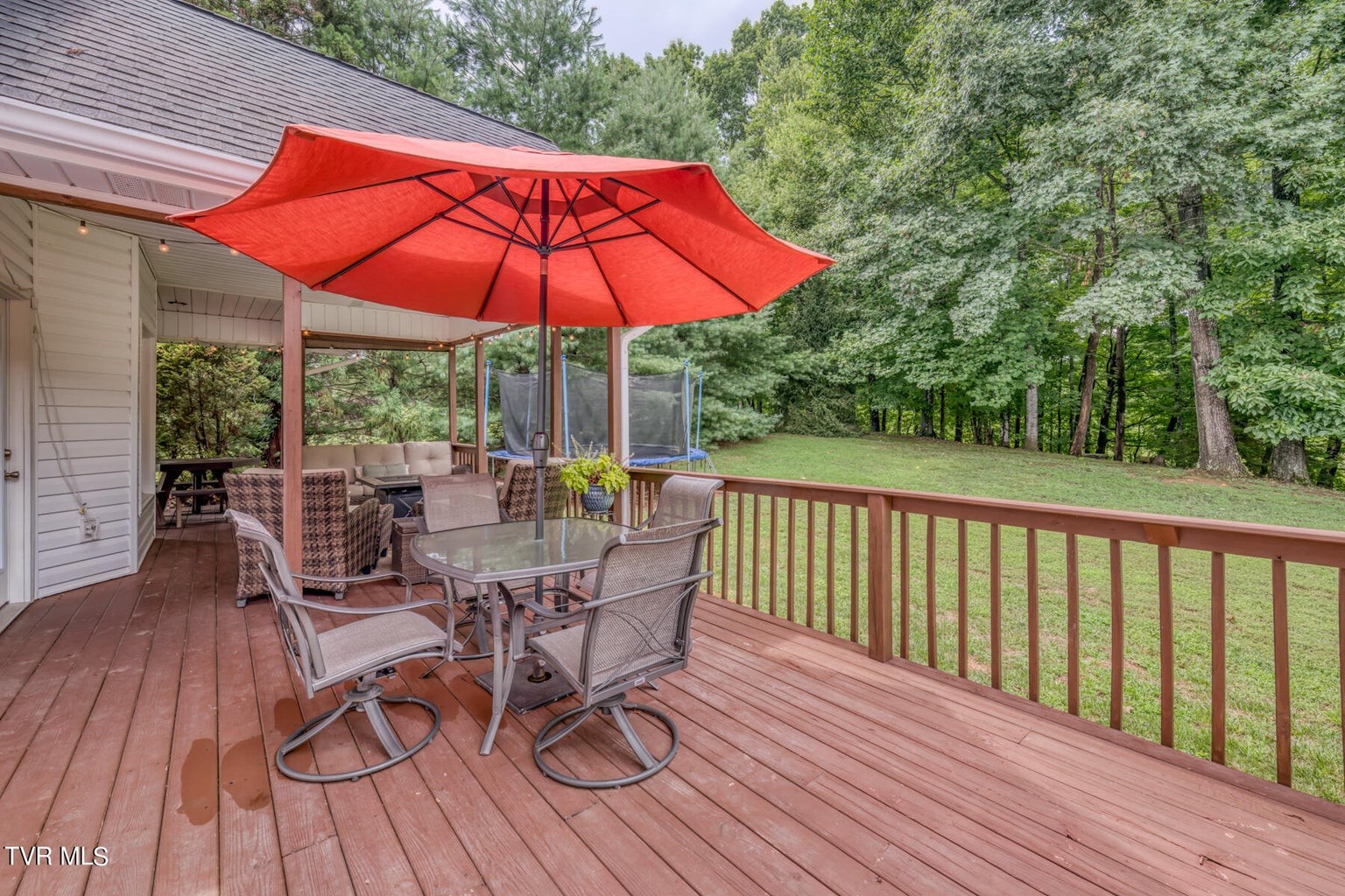 1828 Weaver Branch Road Piney Flats, TN 37686 - Photo 8 of 54 a view of balcony with outdoor seating and wooden floor