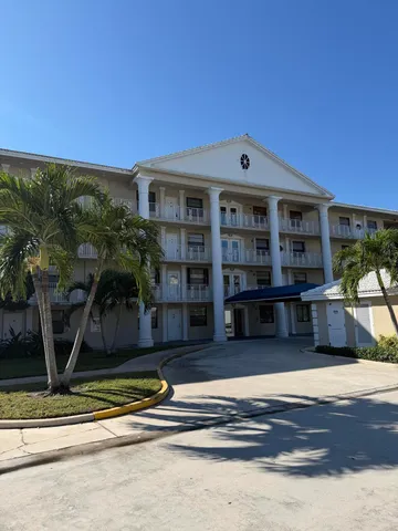 a front view of a house with a porch