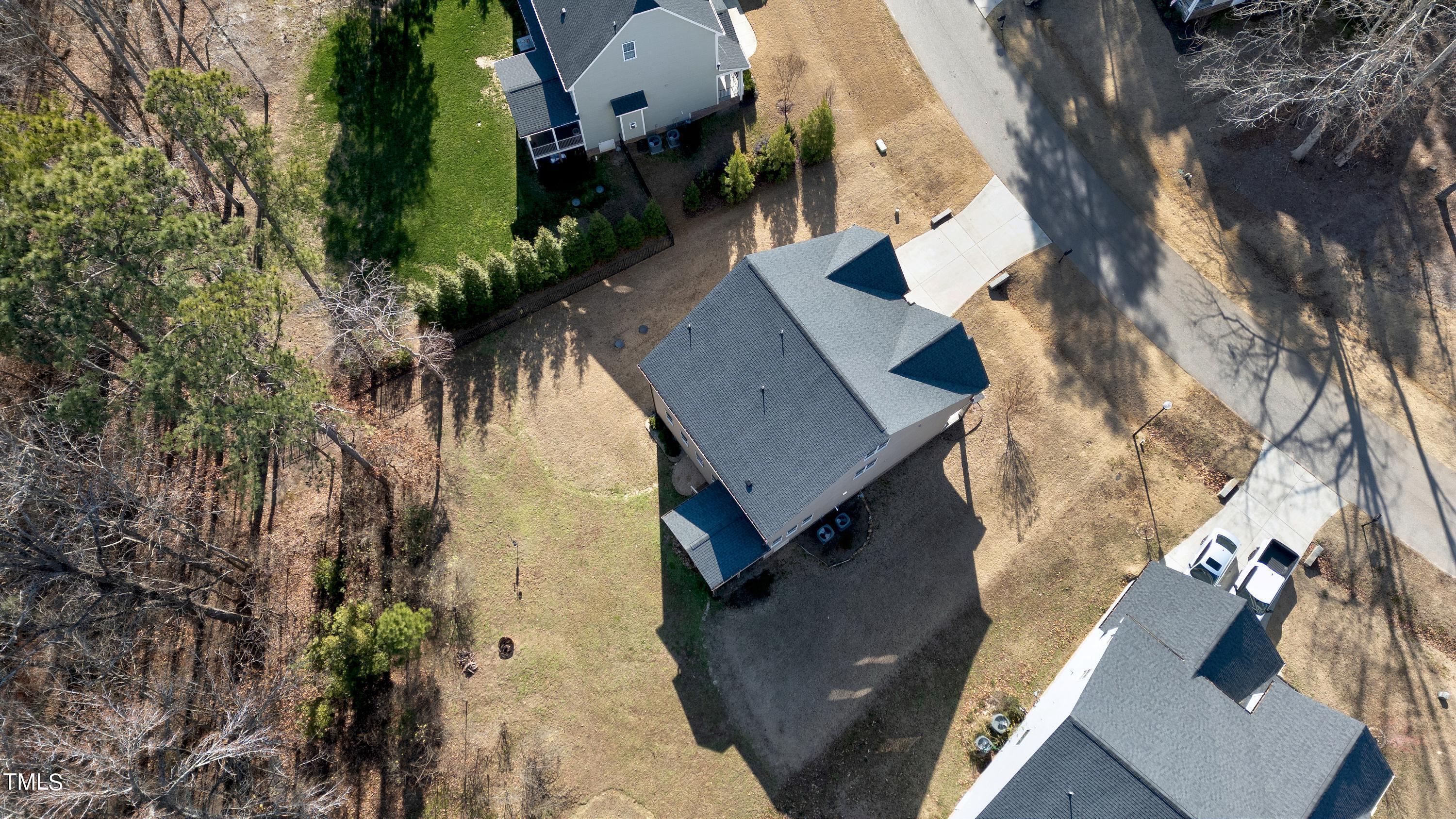 8533 Hurst Drive Raleigh, NC 27603 - Photo 34 of 43 an aerial view of residential houses with outdoor space