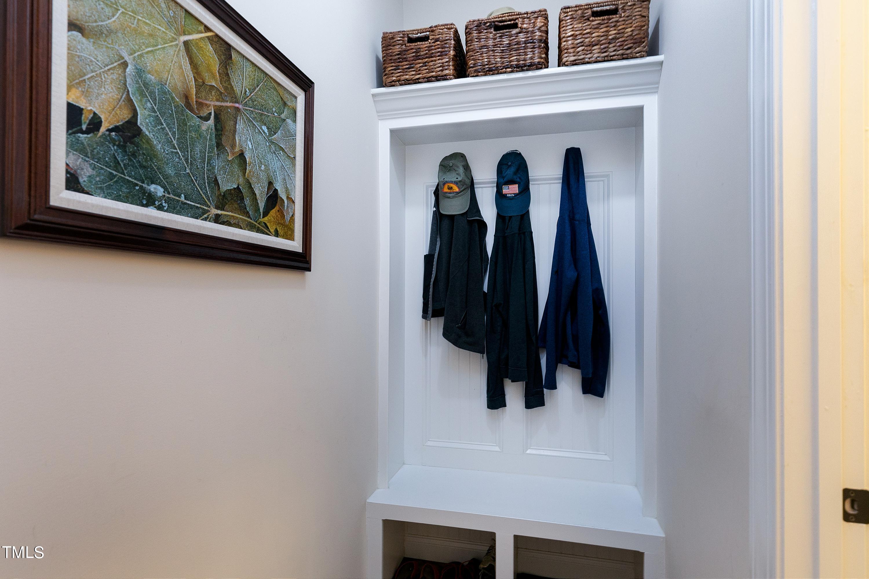 8533 Hurst Drive Raleigh, NC 27603 - Photo 42 of 43 a close view of a painting on the wall