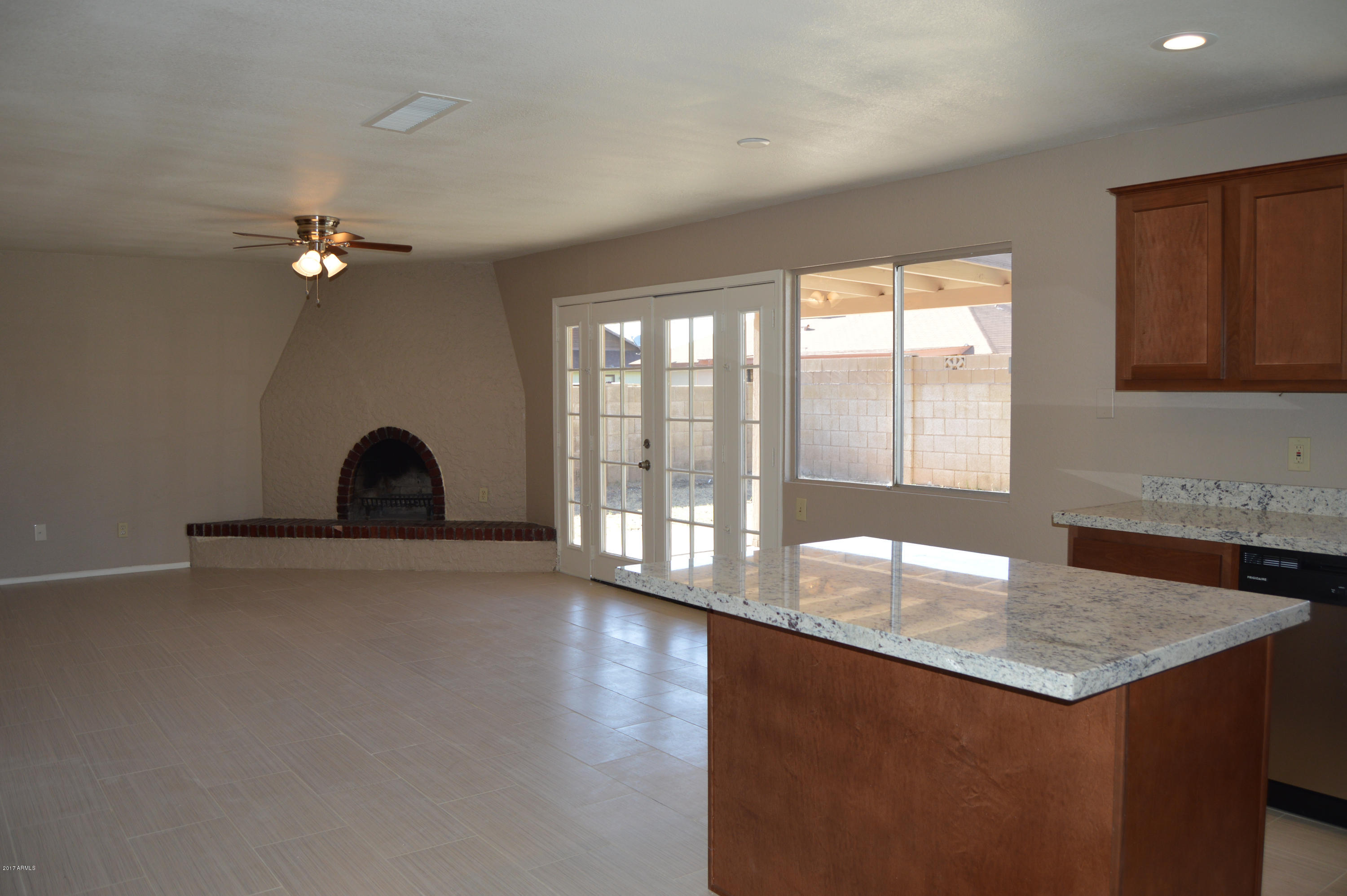 4414 West Calavar Road Glendale, AZ 85306 - Photo 8 of 27 Kitchen/Family Room