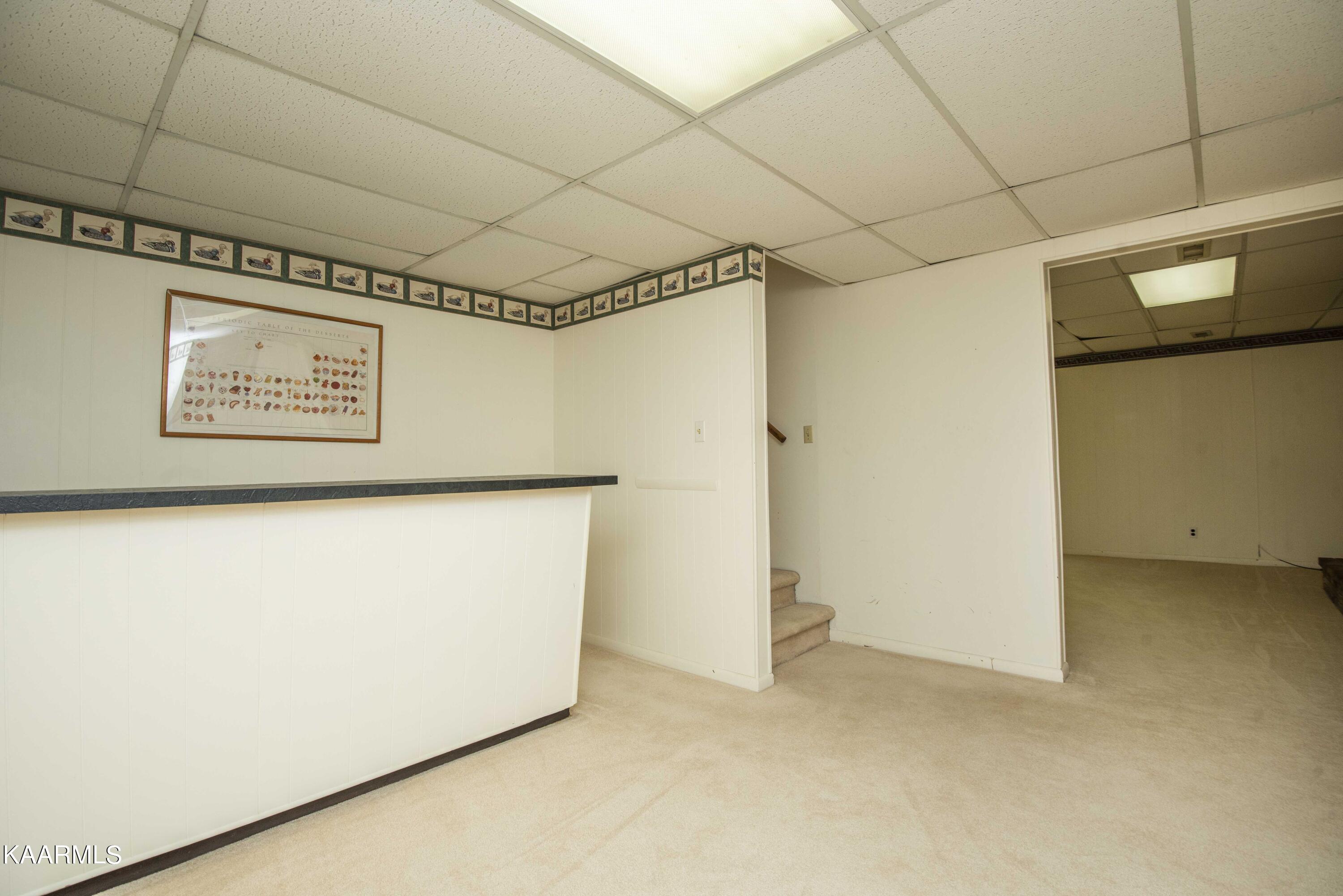 28 Montclair Road Oak Ridge, TN 37830 - Photo 30 of 57 Basement Rec Room into Family Room