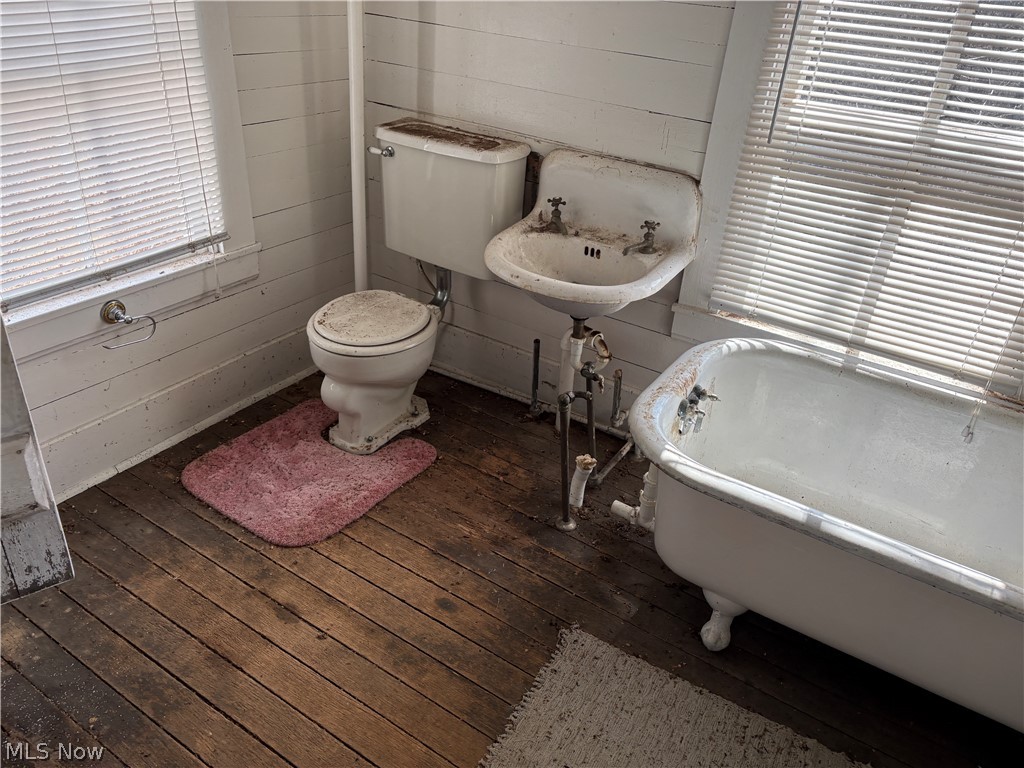 0 Tract 8 Barber Ridge Road Lewisville, OH 43754 - Photo 24 of 49 Bathroom with hardwood / wood-style flooring, a freestanding tub, and wooden walls