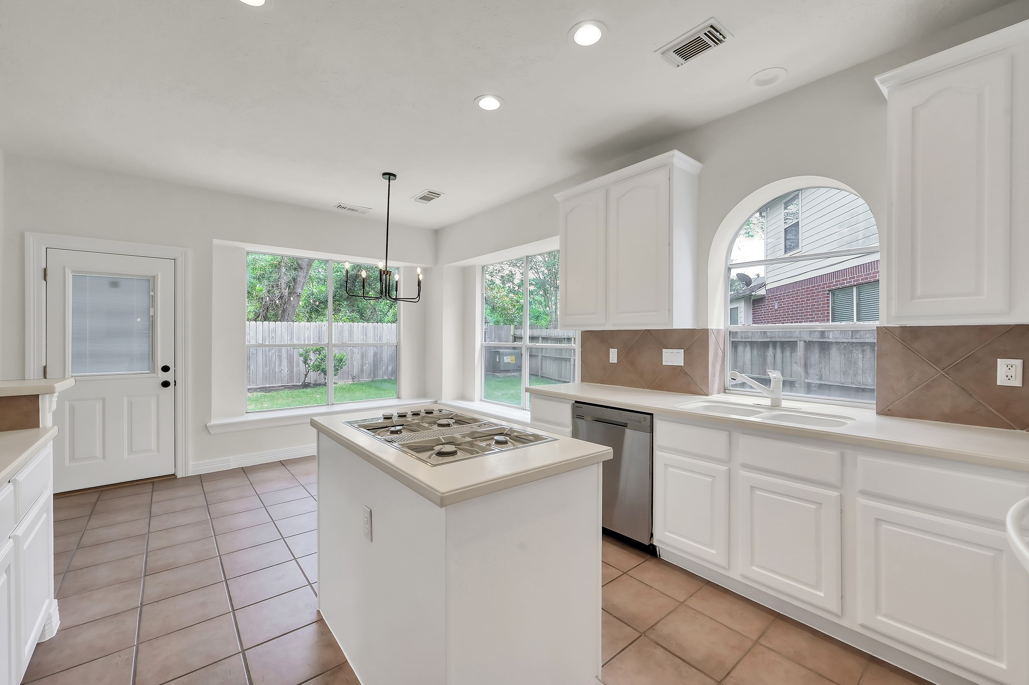 18310 Rittenhouse Park Court Spring, TX 77379 - Photo 12 of 35 All new can lights and light fixtures throughout.