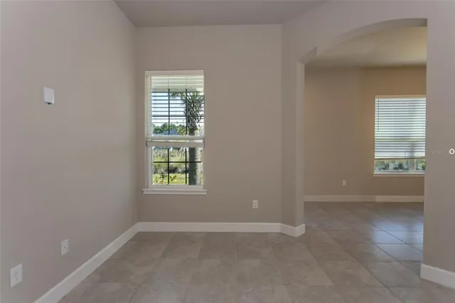 an empty room that has a window