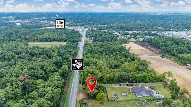 an aerial view of residential house and outdoor space