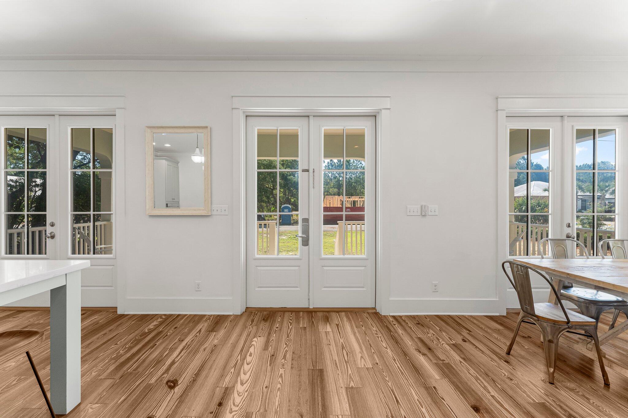 515 Seacrest Drive Inlet Beach, FL 32461 - Photo 15 of 62 a view of a livingroom with wooden floor and furniture