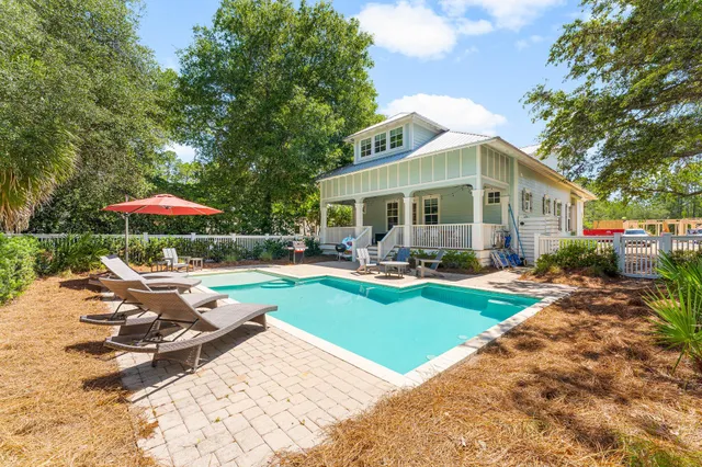 a view of a balcony with wooden floor
