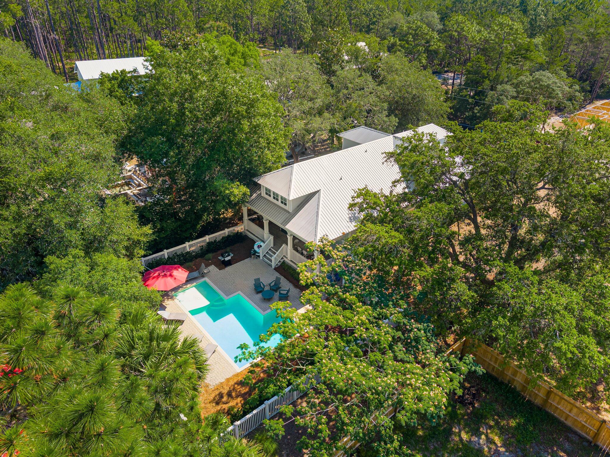 515 Seacrest Drive Inlet Beach, FL 32461 - Photo 22 of 62 an aerial view of residential house with outdoor space and swimming pool