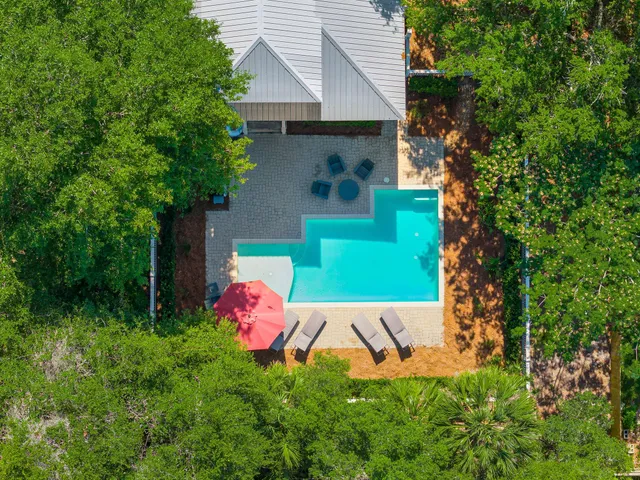 a view of a porch with wooden floor