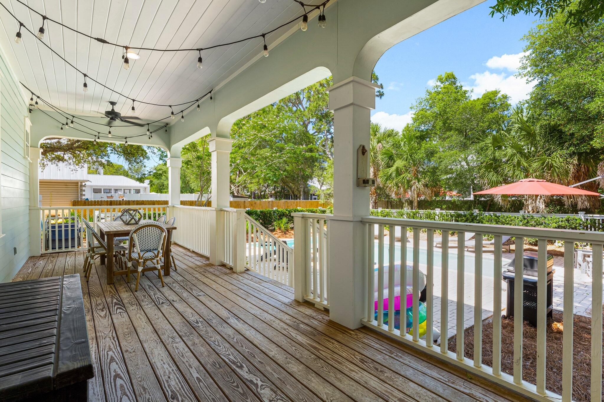 515 Seacrest Drive Inlet Beach, FL 32461 - Photo 23 of 62 a view of a balcony with wooden floor