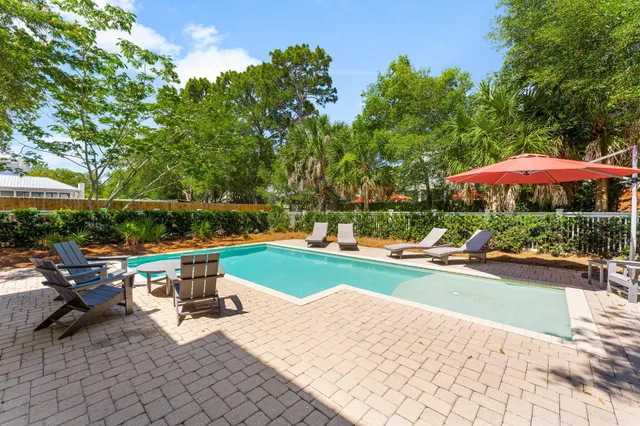 a bedroom with a bed and a flat tv screen