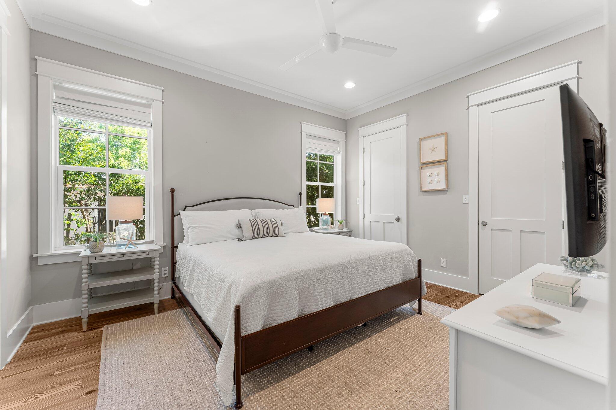 515 Seacrest Drive Inlet Beach, FL 32461 - Photo 26 of 62 a bedroom with a bed and a flat tv screen