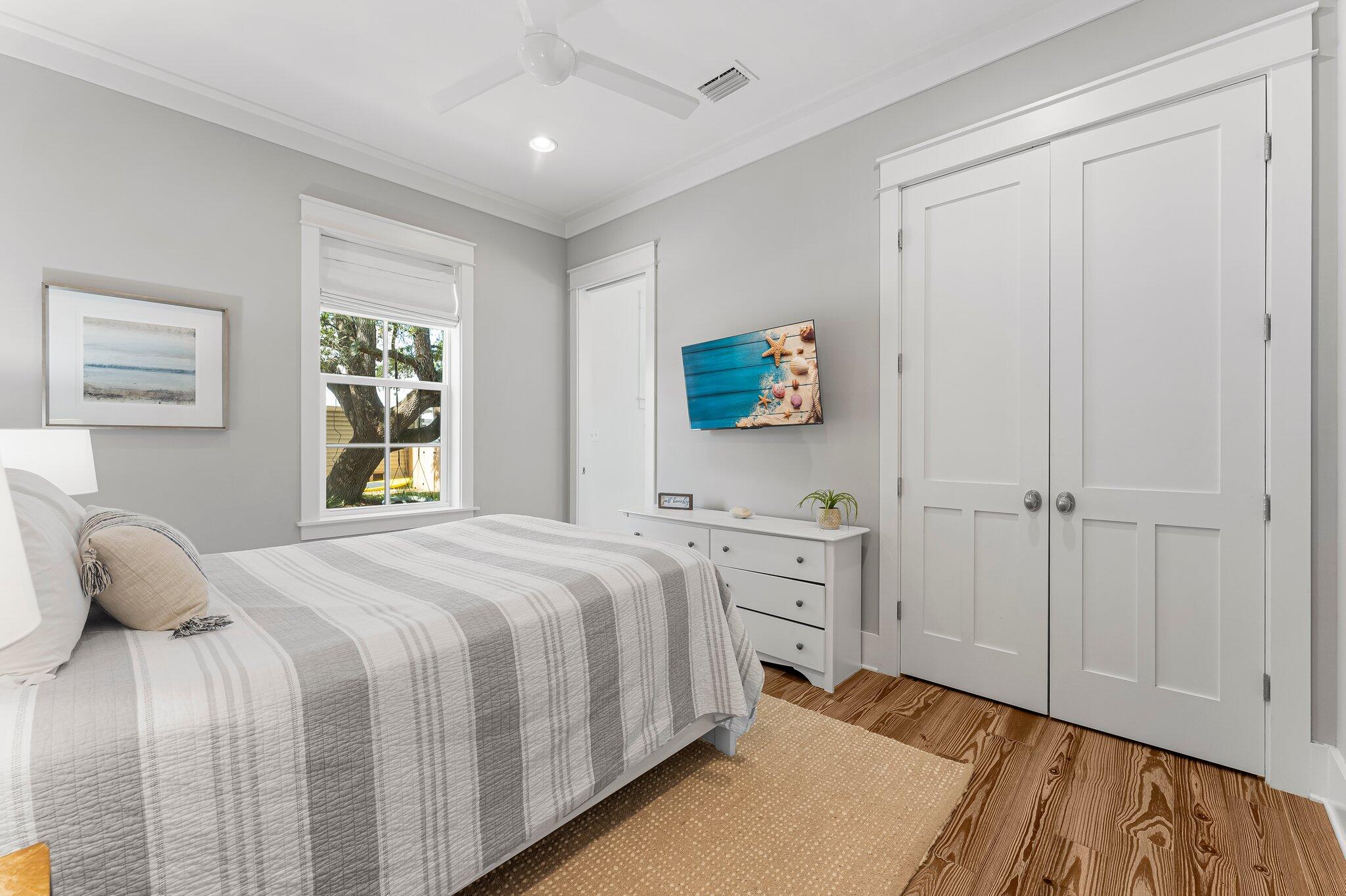515 Seacrest Drive Inlet Beach, FL 32461 - Photo 30 of 62 a bedroom with a bed and a window